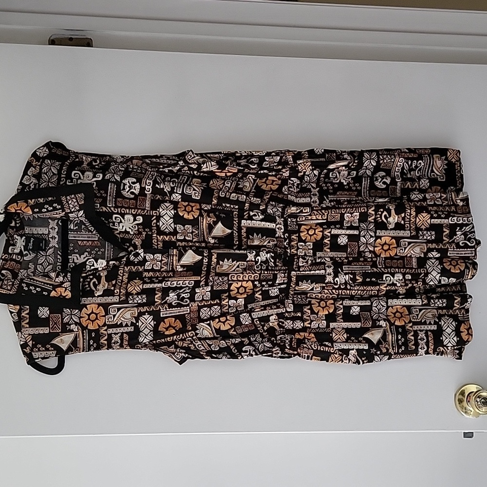 Disney Trader Sam’s / Enchanted Tiki Romper